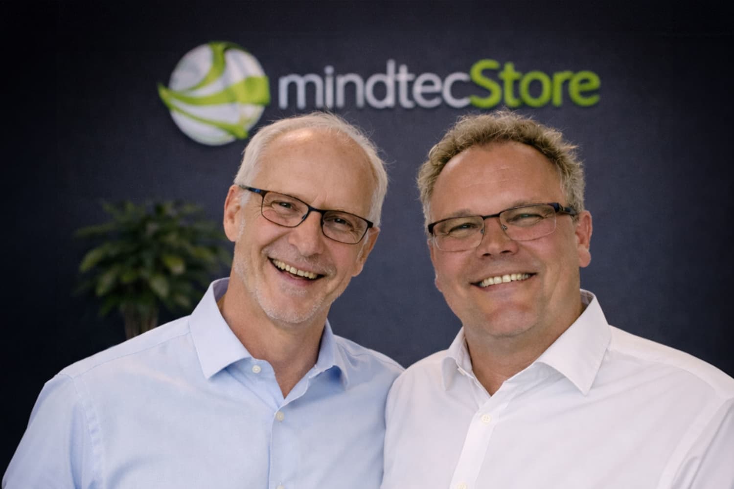 Die Geschäftsführer von MindTecStore: links Harald Baums, rechts Hans‑Georg Bieschke, nebeneinander porträtiert.